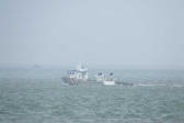 Pointe de Grave : bateau dans la brume.