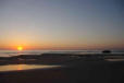 Soulac sur Mer : soleil cochant sur l'l'horizon.