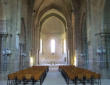flaran : l'abbaye, la nef, le choeur, les rangées de chaises