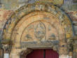 Nogaro : tympan du portail de la collégiale Saint-Nicolas