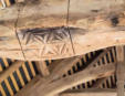 Abbaye de l'Ile Chauvet :signature sur une poutre de charpente dans les batiments existants