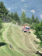 Doucy combelouvière : domaine de valmorel en été, camion de collecte du foin