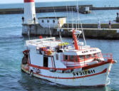 Le Guilvinec : arrivée bateau de pêche en fin de journée