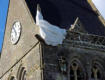 Sainte Mère l'église :l'église avec son parachutiste suspendu au clocher
